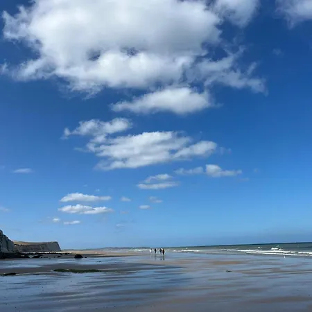 Au Pied Du Cap, Les Pieds Dans L'eau